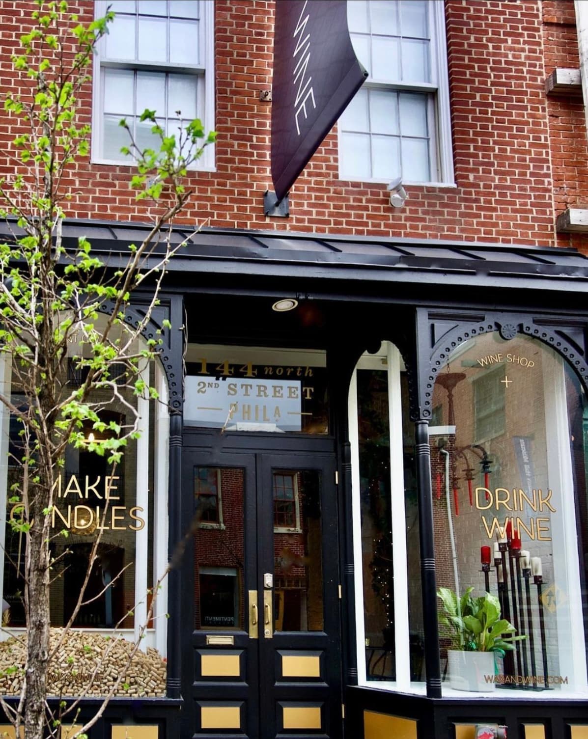 The Wax + Wine storefront at 144 N 2nd St in Old City Philadelphia